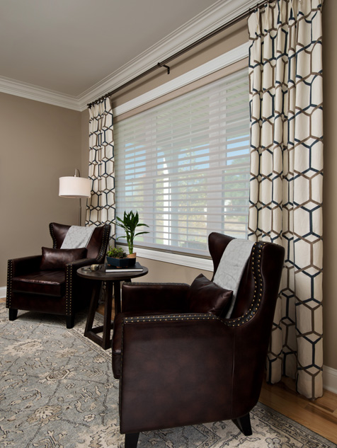 Custom Draperies over Silhouette® Window Shadings in the Living Room